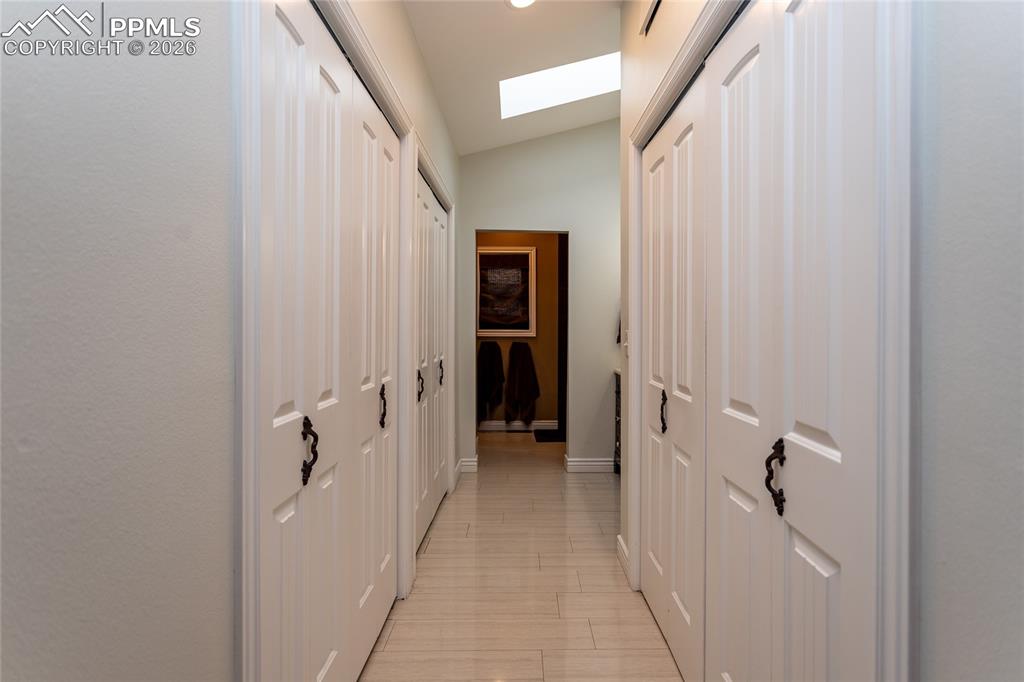 Image 26 of 45: Spacious closets providing you with plenty of storage lead you into the bat