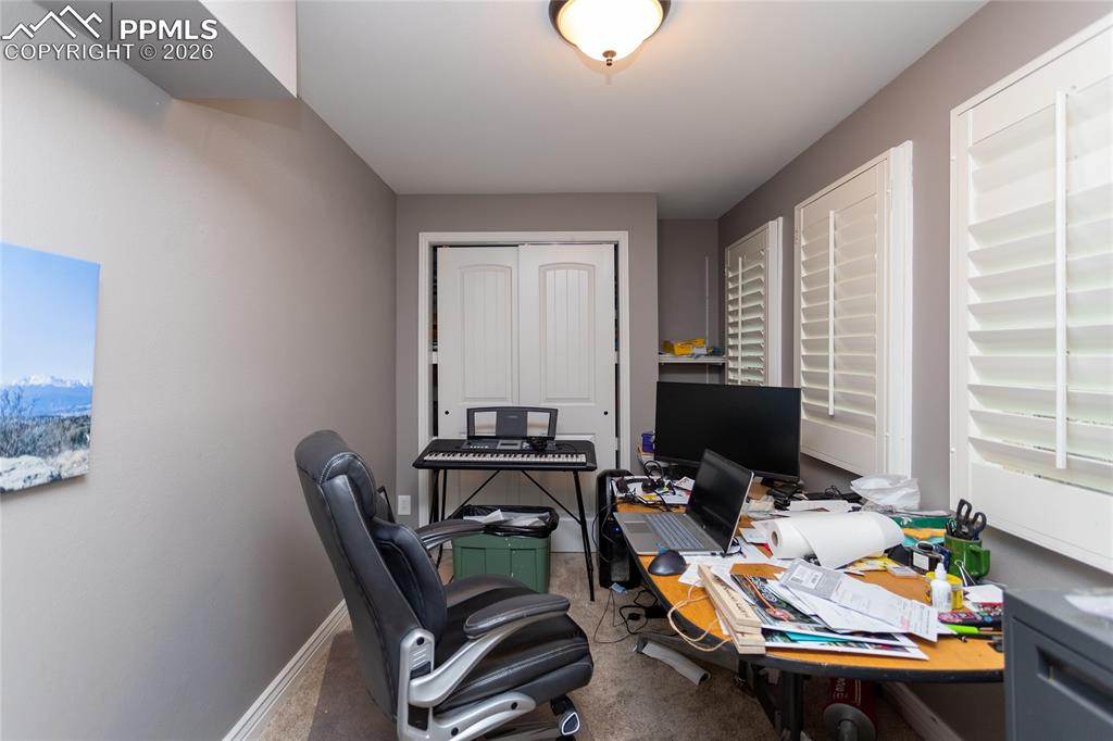 Image 36 of 45: Another roomy downstairs bedroom with tons of light.  Perfect for family, g