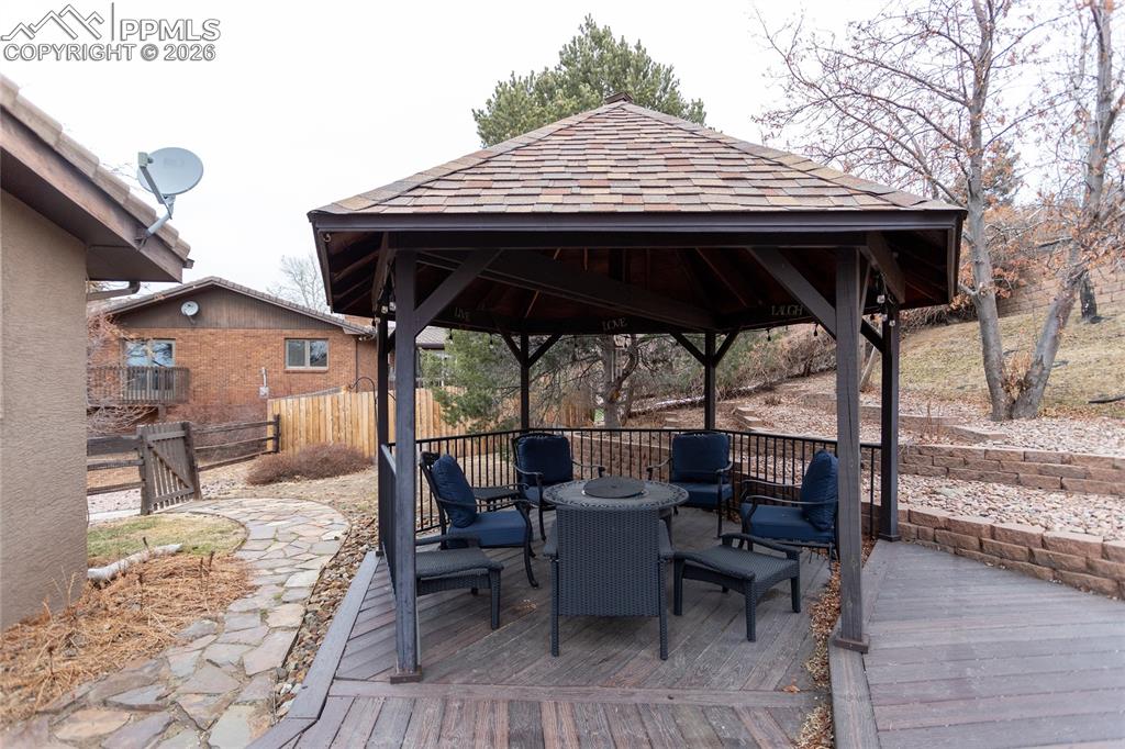 Image 40 of 45: Custom, roomy, covered, gazebo lets you entertain out of the elements while
