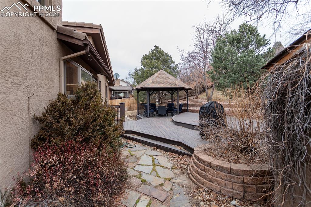 Image 41 of 45: Your private, beautiful, backyard oasis includes lovely stone pavers that a