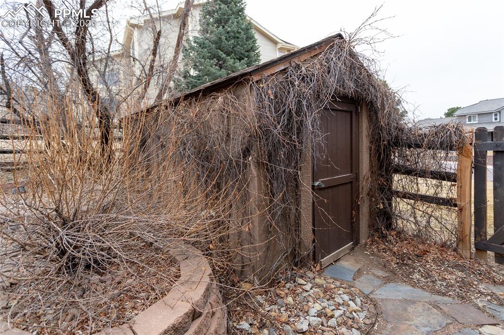 Image 43 of 45: A convenient, custom storage shed for lawn equipment, sports gear or extra 