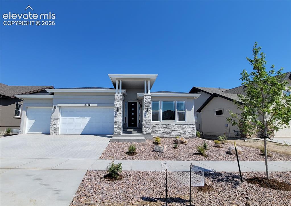 Image 1 of 50: Hillingdon-Prairie Elevation-3 Car Garage-Finished Basement-Ranch Plan-Ener
