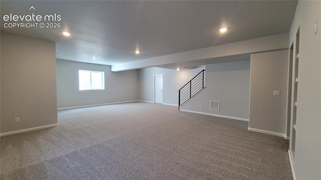 Image 38 of 50: Finished Basement with 9