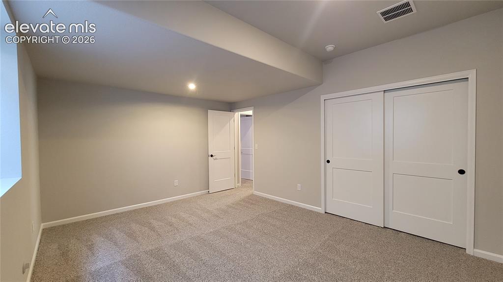 Image 42 of 50: 4th Bedroom, located in the lower-level!