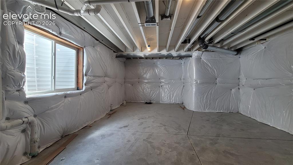Image 45 of 50: Storage room prepped for a future bathroom!