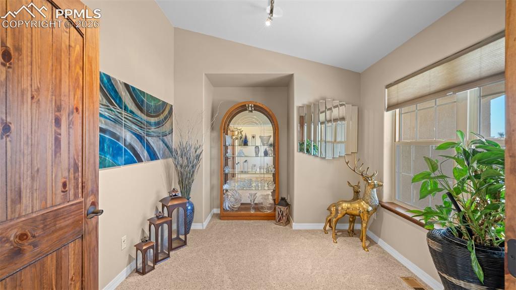 Image 12 of 50: Double door entry flex room, potential office, formal dining or possible 5t
