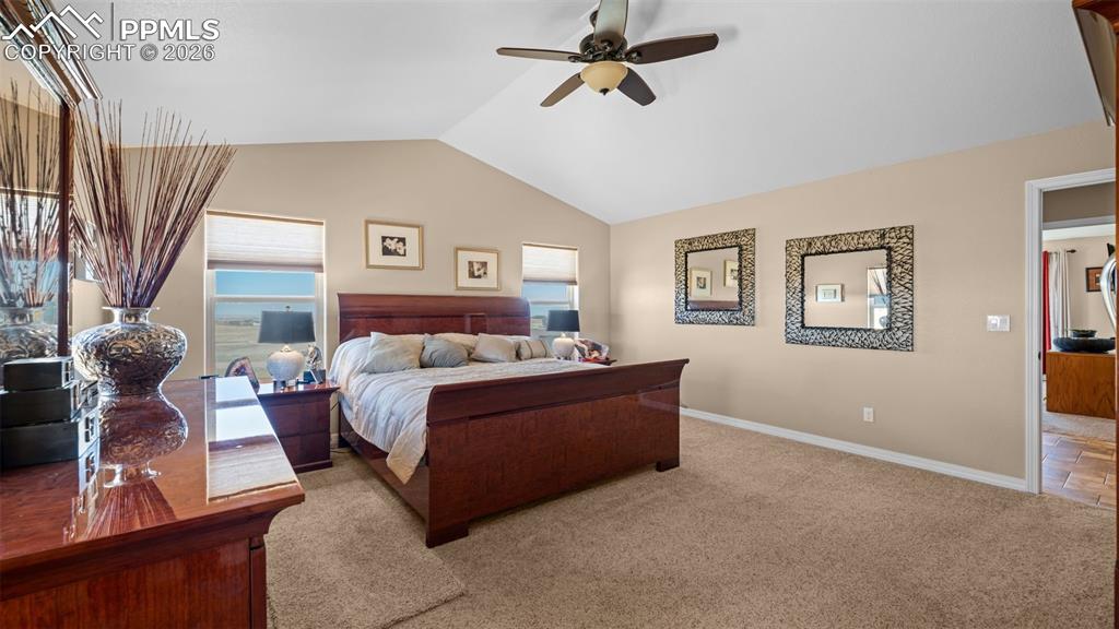 Image 20 of 47: Primary bedroom, vaulted ceiling, adjoining 5 piece bath