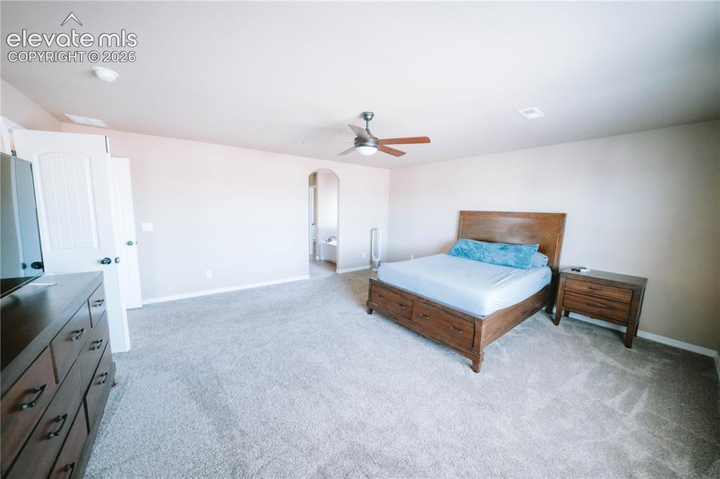Image 21 of 30: Master Bedroom