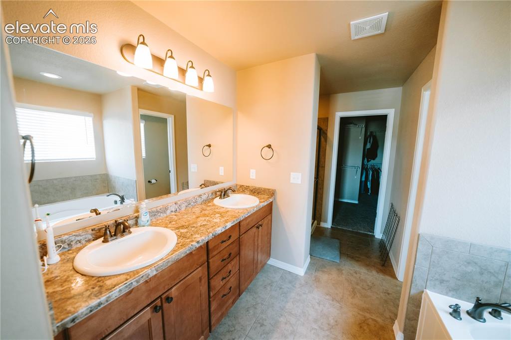 Image 22 of 30: Master Bathroom