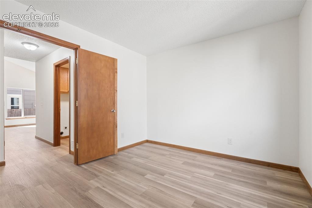 Image 15 of 41: Large office that could be a 5th bedroom (no closet) with bathroom and walk