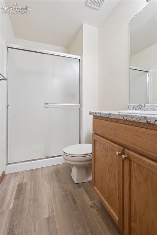 Image 17 of 41: New Flooring, cabinet, countertops