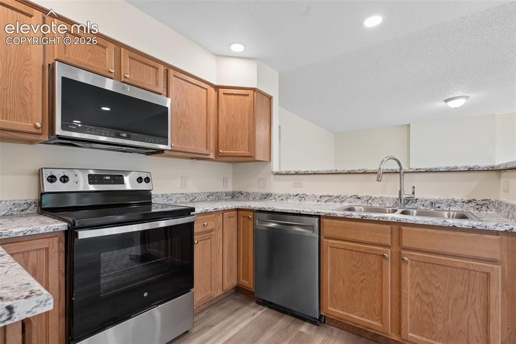 Image 2 of 41: New kitchen cabinets, new countertops, new stove, new dishwasher, new micro
