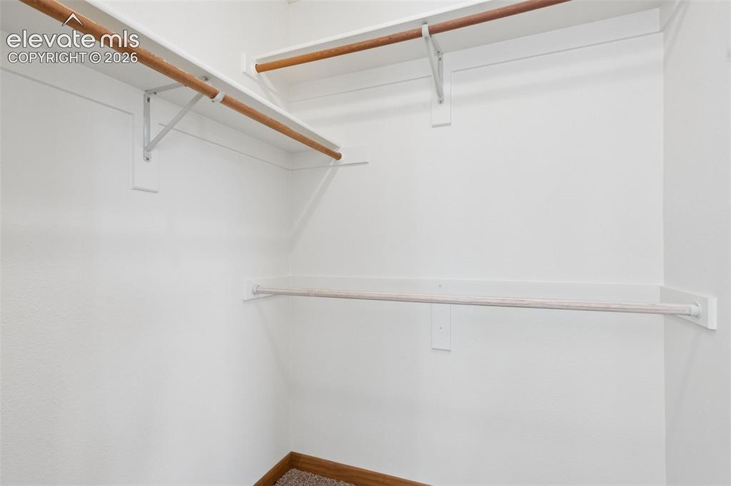 Image 26 of 41: Walk in closet along with second closet in bedroom