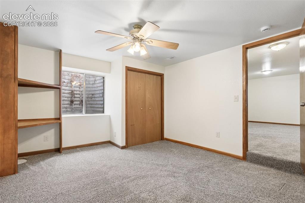 Image 36 of 41: Separate area in family room in basement