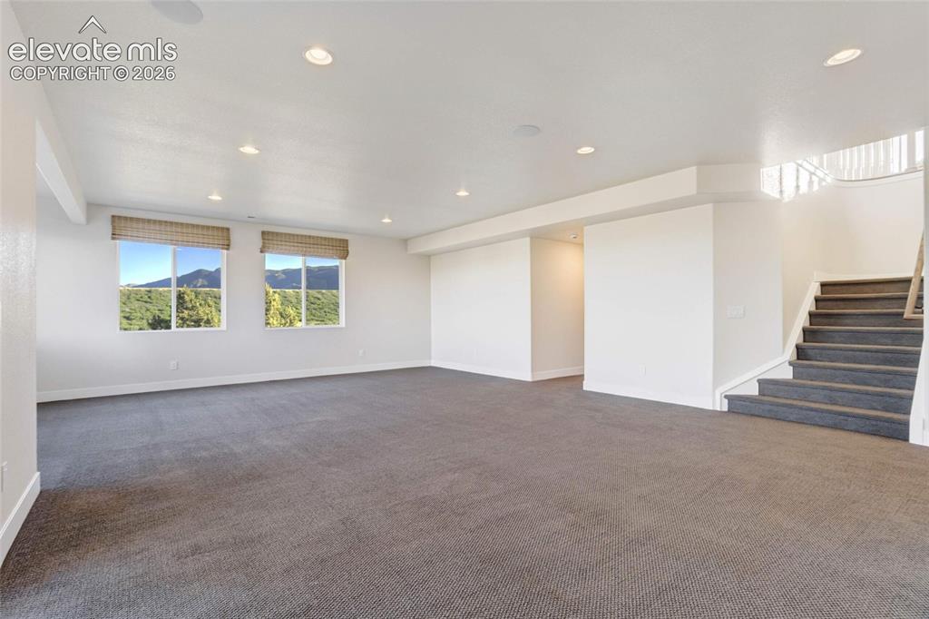 Image 40 of 50: Views and natural light in this spacious family room