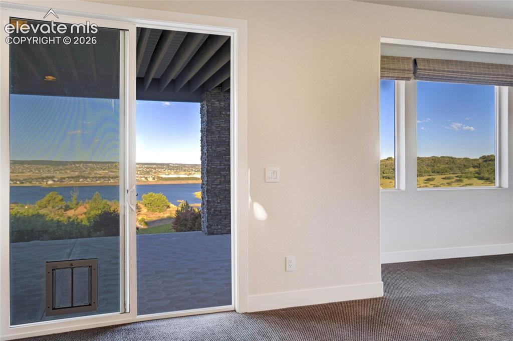 Image 41 of 50: Walkout basement with views of the lake