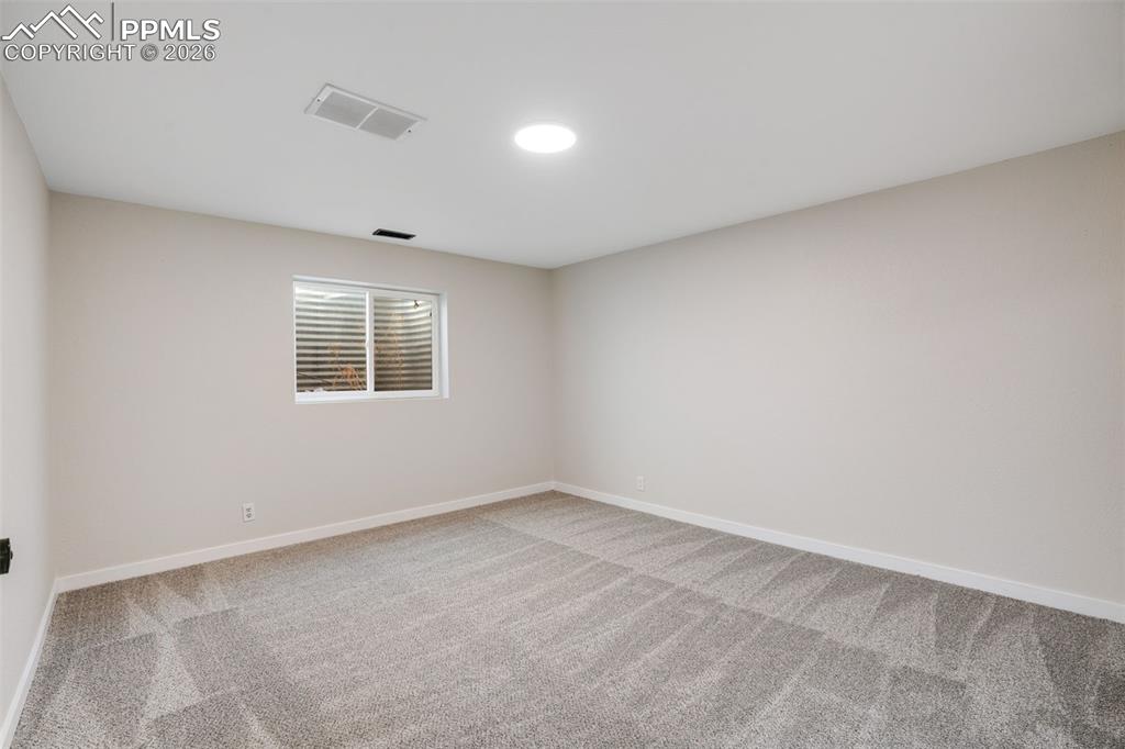 Image 15 of 35: Basement Bedroom 1