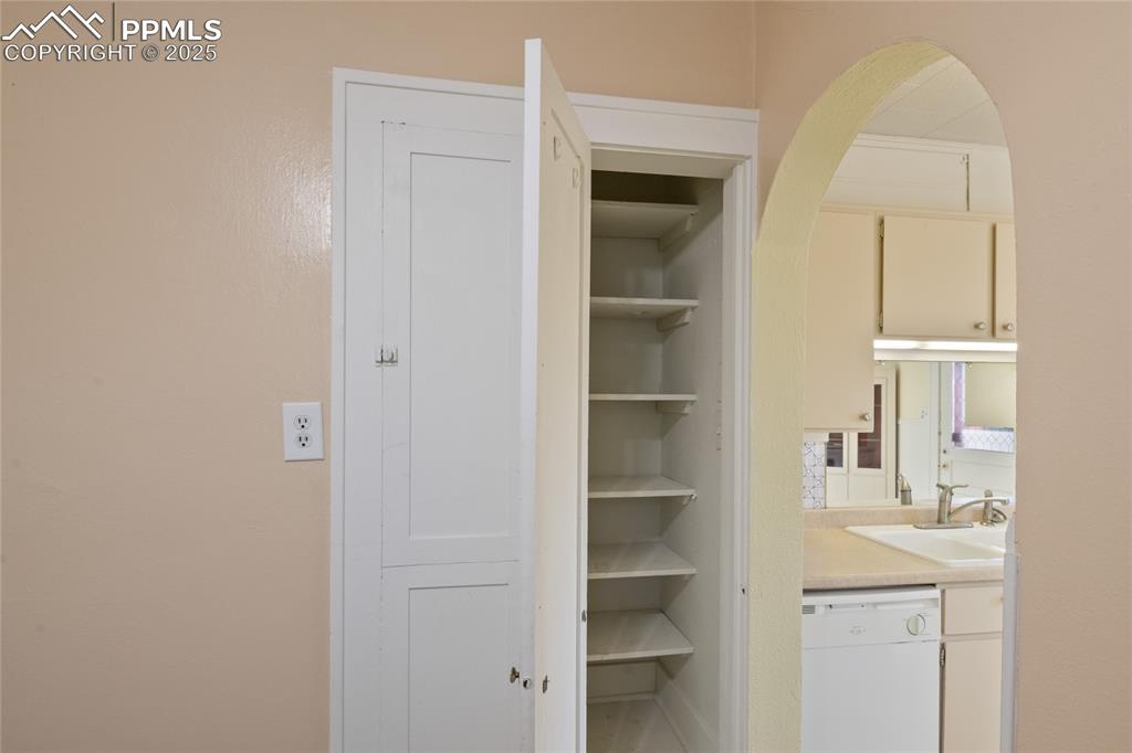 Image 13 of 28: Closet featuring a sink