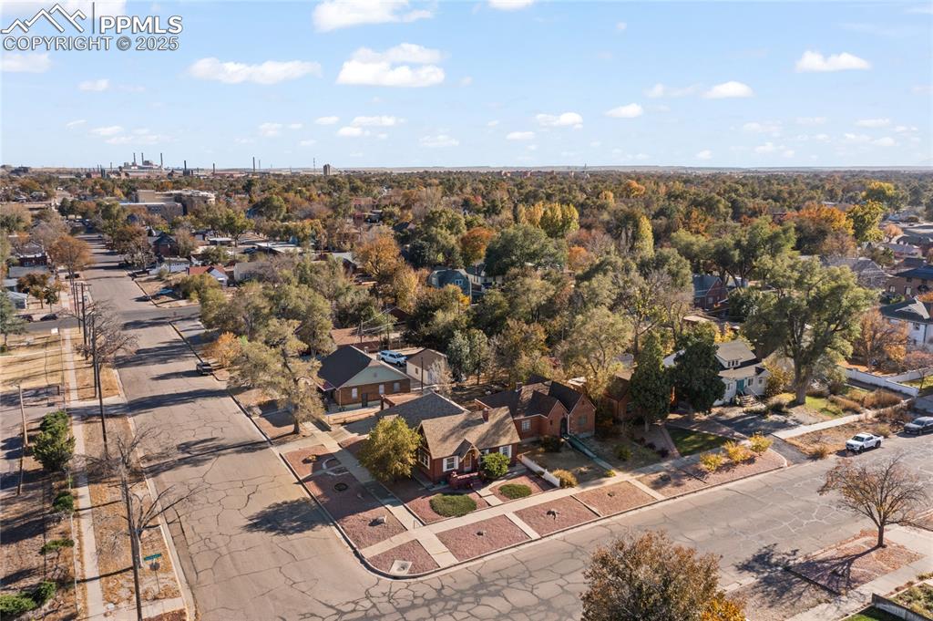 Image 3 of 28: Aerial view of property and surrounding area featuring nearby suburban area