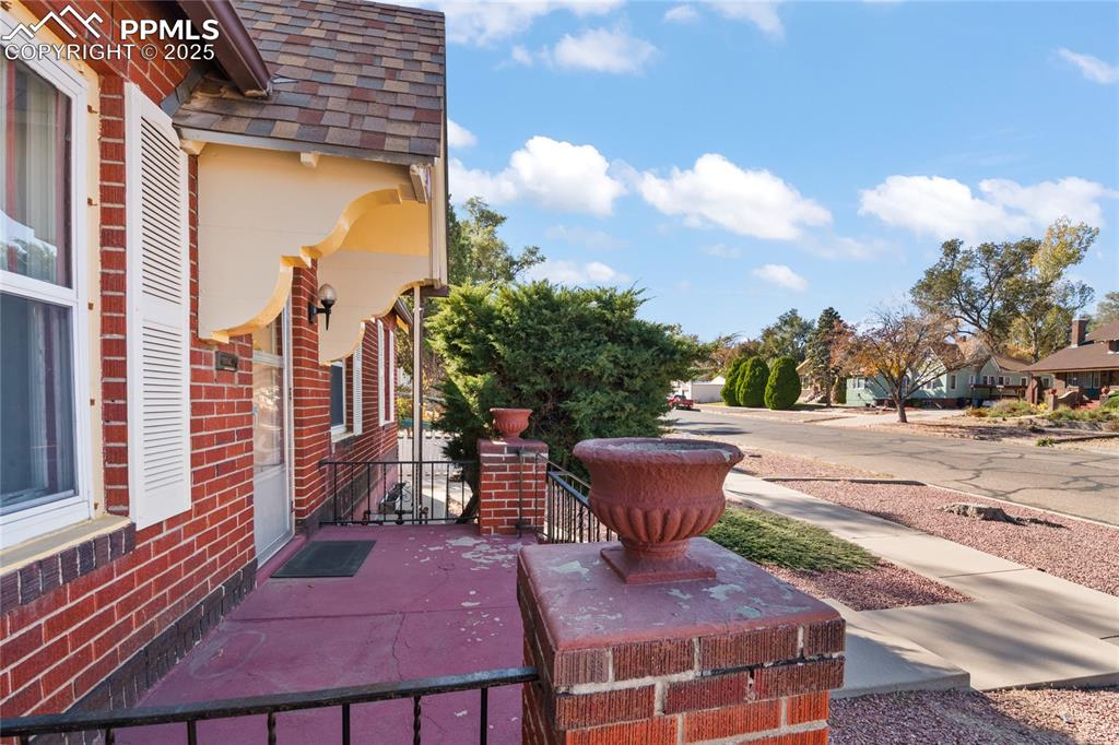 Image 8 of 28: View of patio / terrace with a residential view