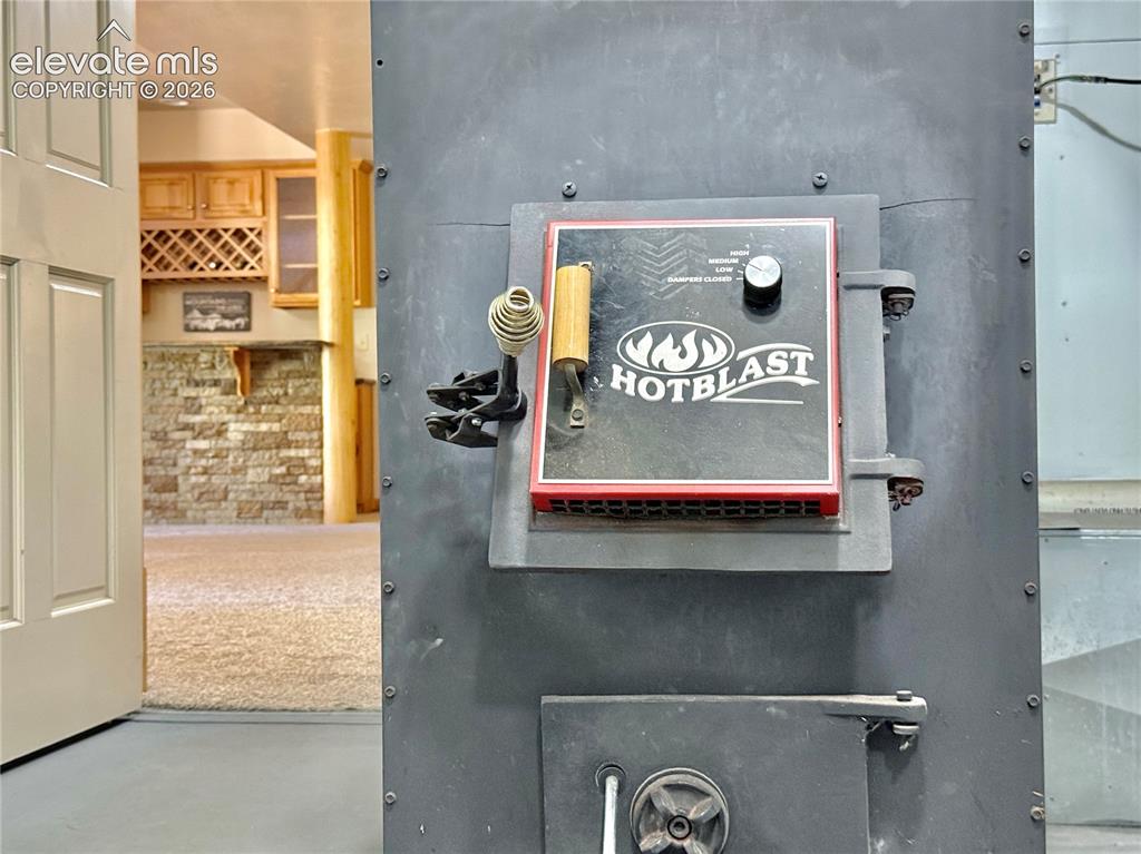 Image 31 of 35: HOT BLAST integrated wood burning furnace as optional heat source!