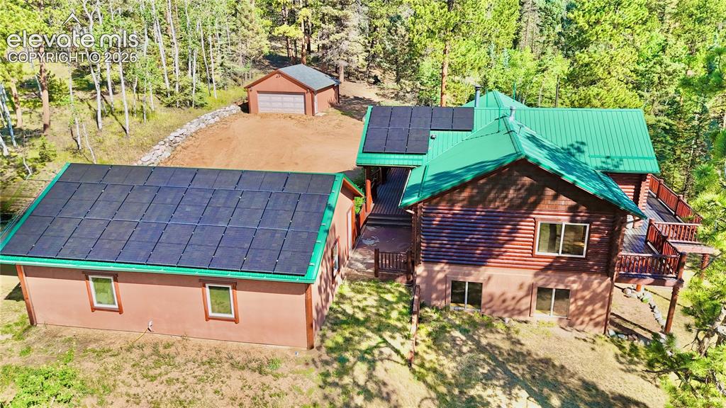 Image 33 of 35: Solar panels paid off & result in net electric bill of $15 average!