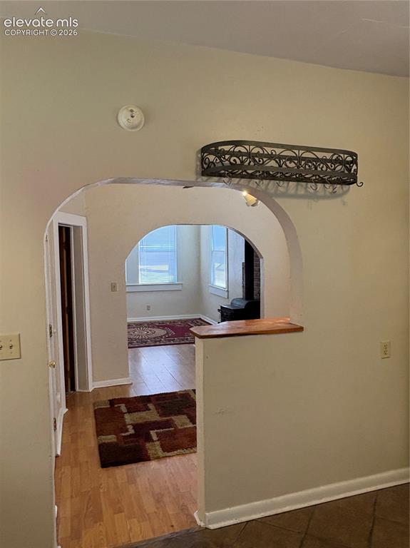 Image 17 of 23: Another view from kitchen into living area