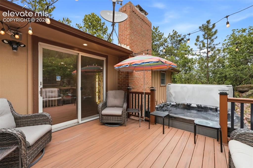 Image 17 of 42: deck features plenty of room for outdoor furniture, making it the perfect s