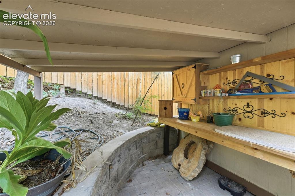 Image 20 of 42: charming, covered outdoor potting shed, perfect for the gardener in all of 