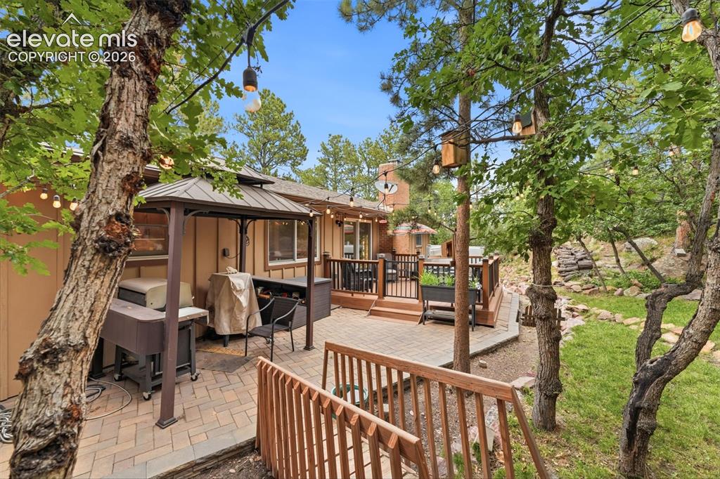Image 21 of 42: Backyard BBQ gazebo included