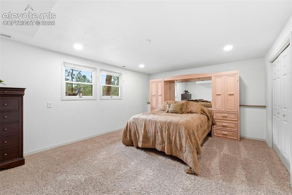 Image 32 of 42: Spacious basement bedroom