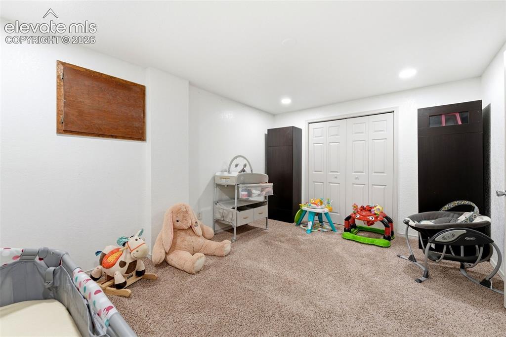 Image 35 of 42: Basement bedroom/ play room
