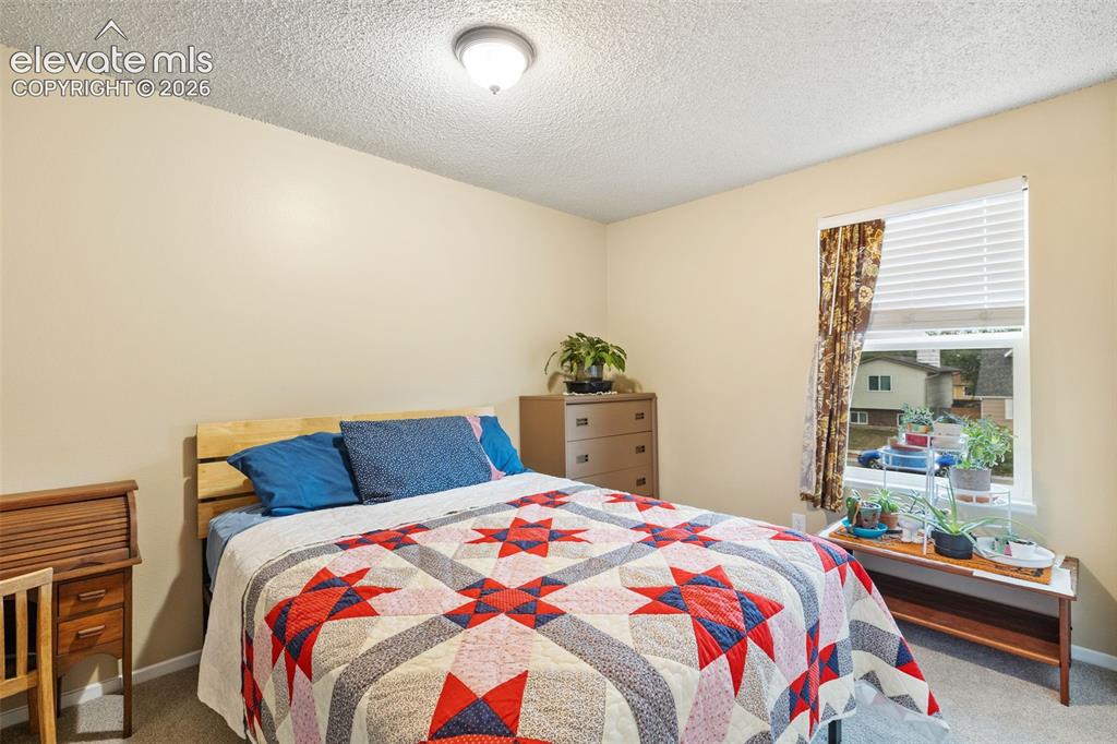 Image 16 of 28: Second bedroom
