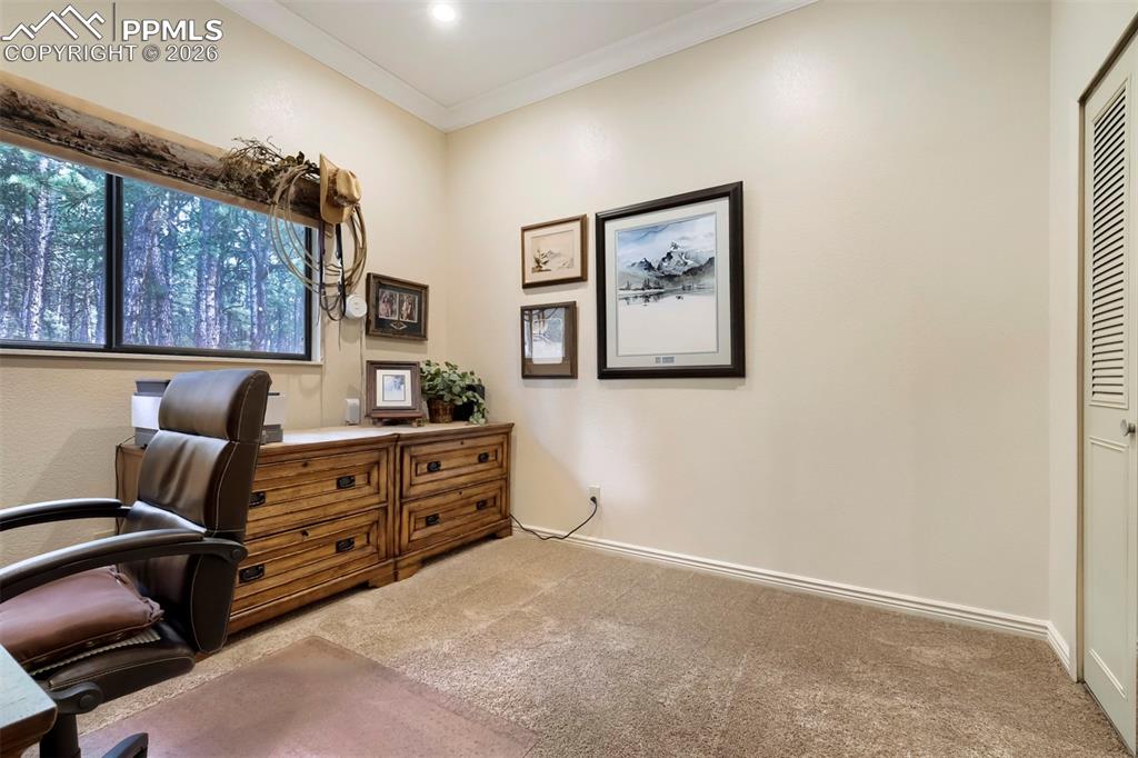 Image 11 of 42: One of two main level bedrooms