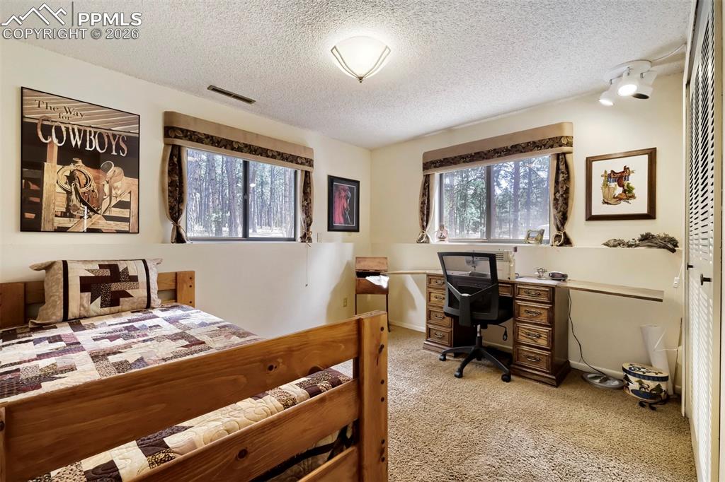 Image 19 of 42: 4th bedroom in main home