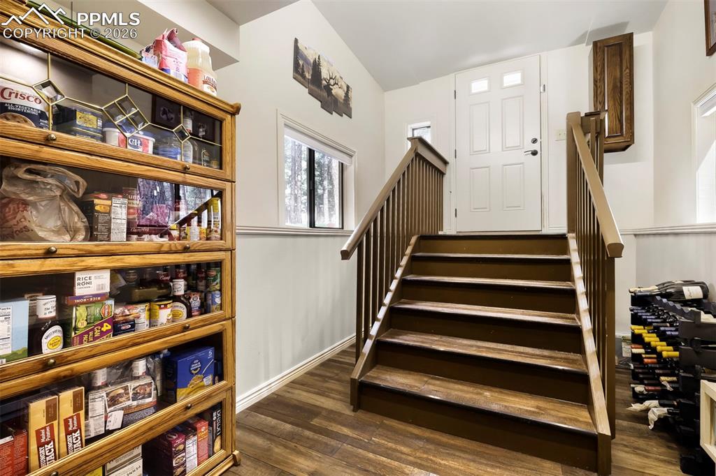 Image 21 of 42: Walkout to back patio, room for storage