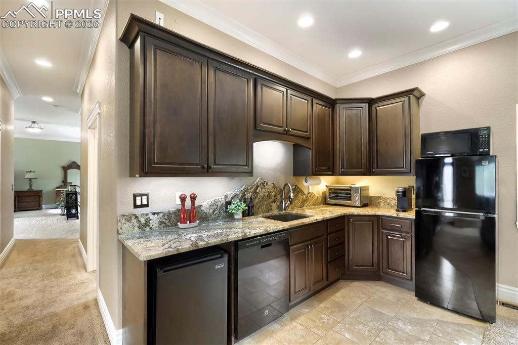 Image 25 of 42: 2nd quarters kitchen with granite