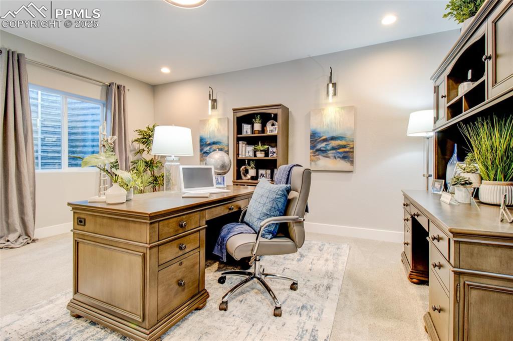 Image 22 of 30: Office featuring light carpet and recessed lighting