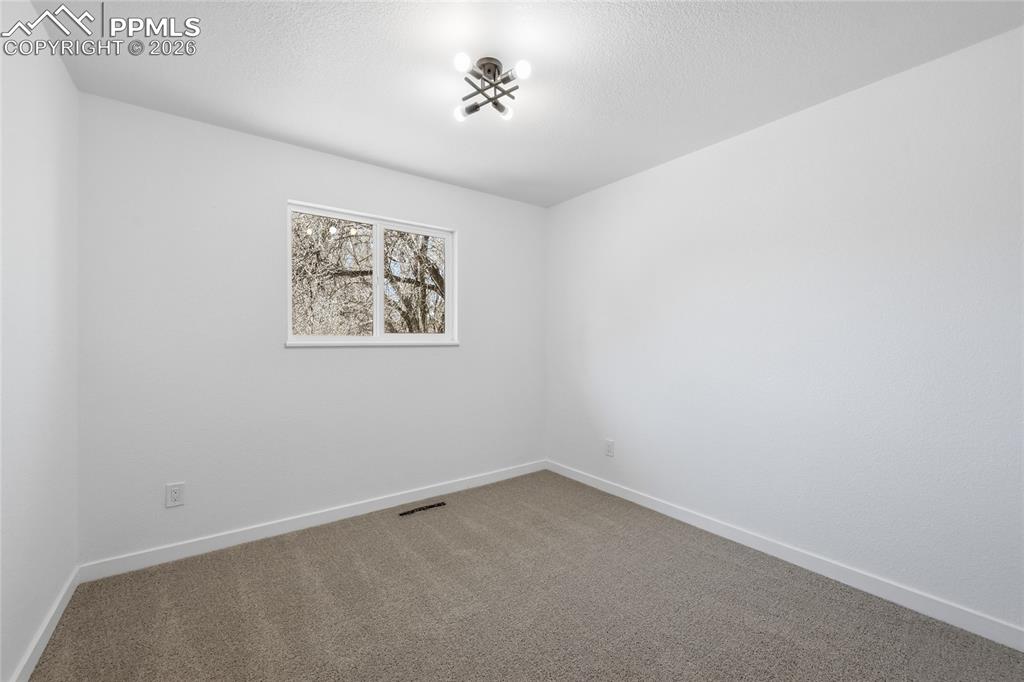 Image 12 of 26: Bedroom