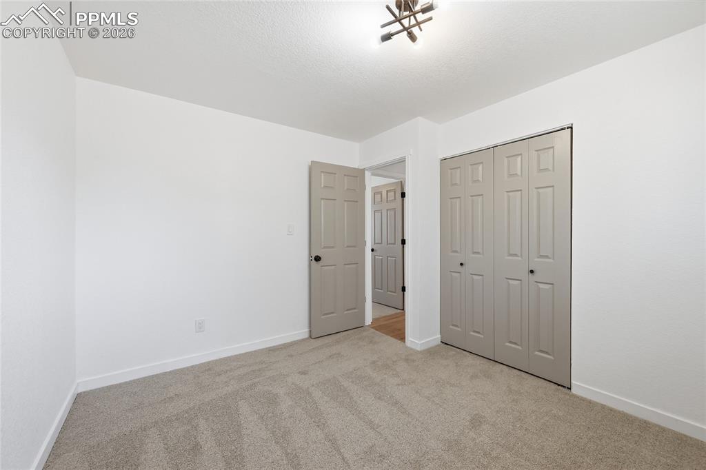 Image 13 of 26: Bedroom