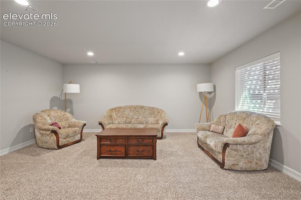 Image 31 of 42: Large Basement Family Room