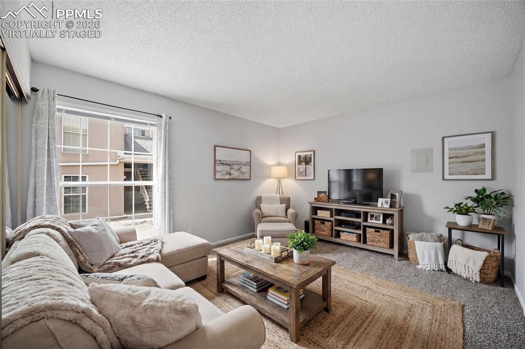 Image 19 of 40: virtually staged - 4th bedroom but can be used as a second family room, off