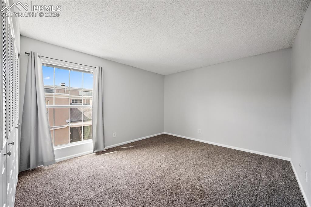 Image 28 of 40: Master Bedroom