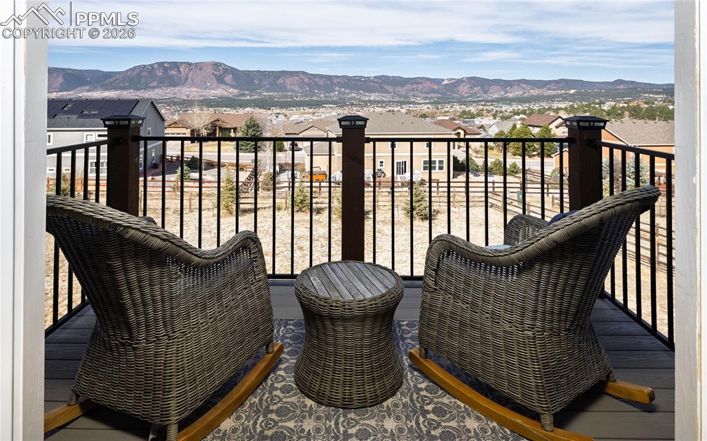 Image 11 of 42: Private balcony off master suite