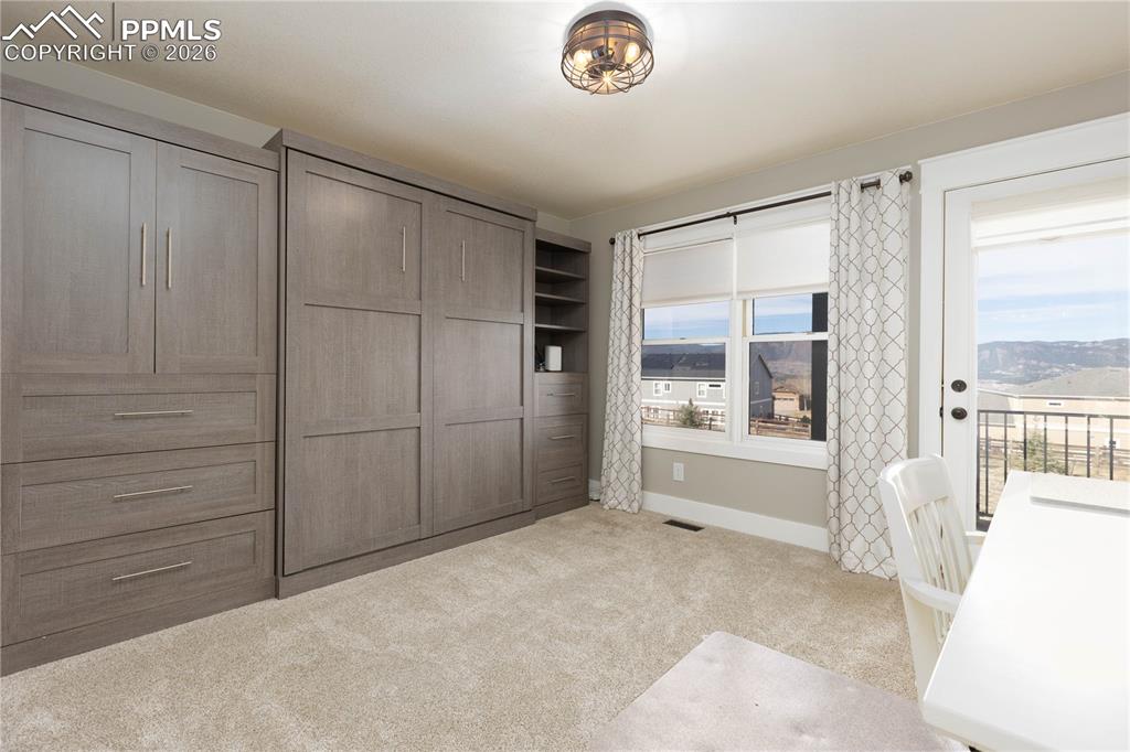 Image 14 of 42: Bedroom/Office with Murphy Bed