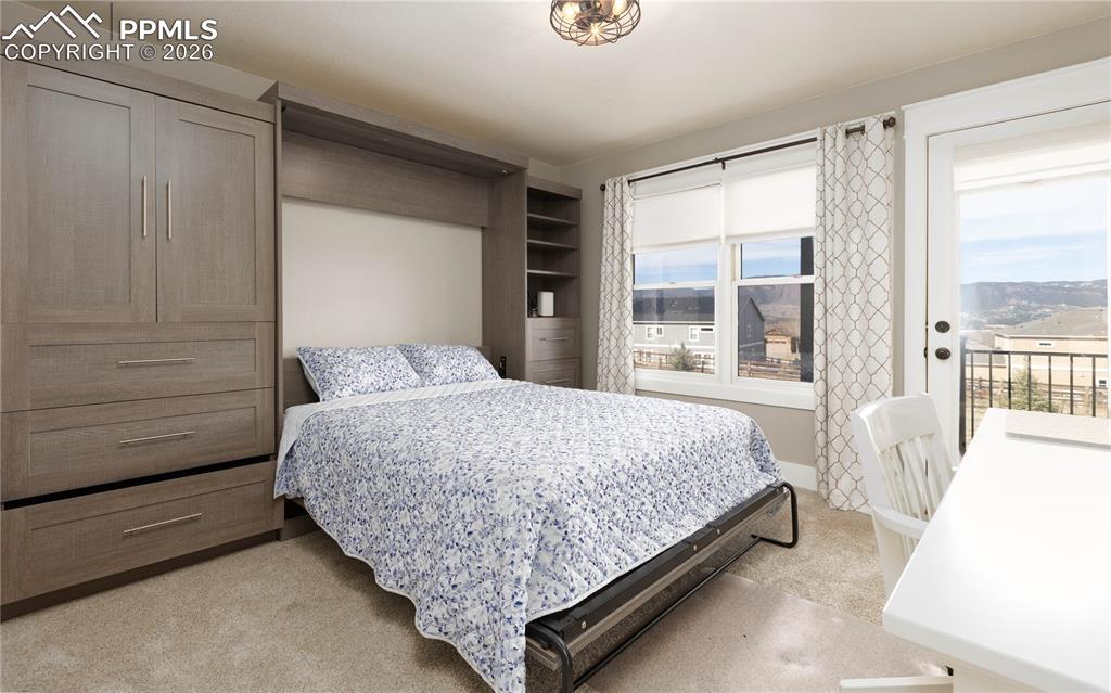 Image 15 of 42: Walk out to composite back deck