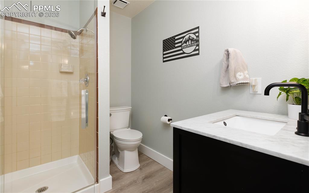 Image 19 of 42: Main floor hall bath