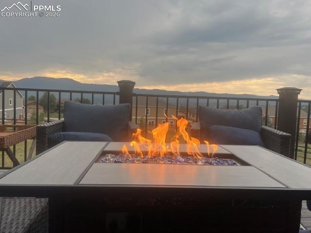 Image 29 of 42: Main deck spans nearly the length of the home