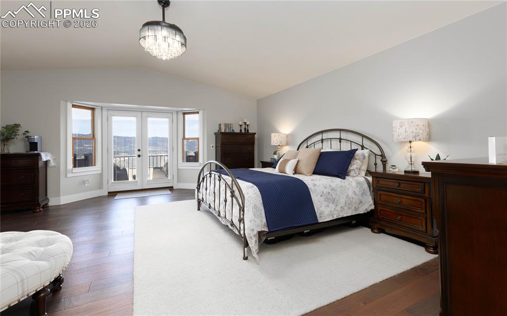 Image 8 of 42: Primary Suite facing the mountain views with private balcony