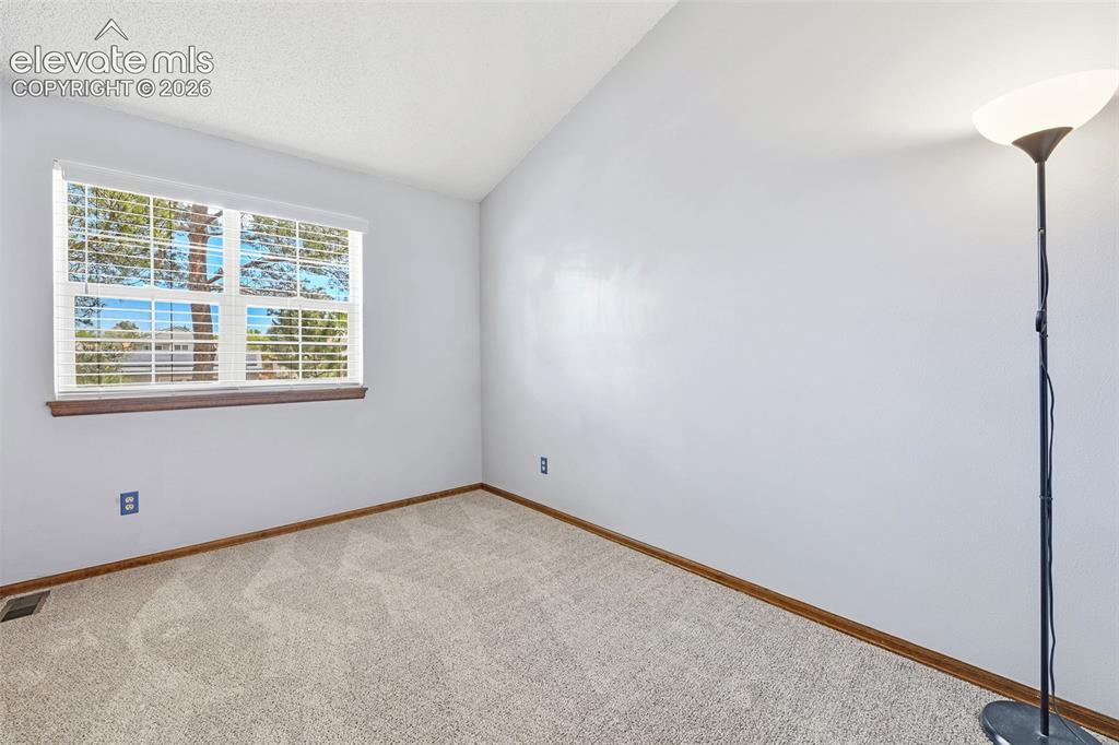 Image 14 of 45: 2nd upper vaulted bedroom